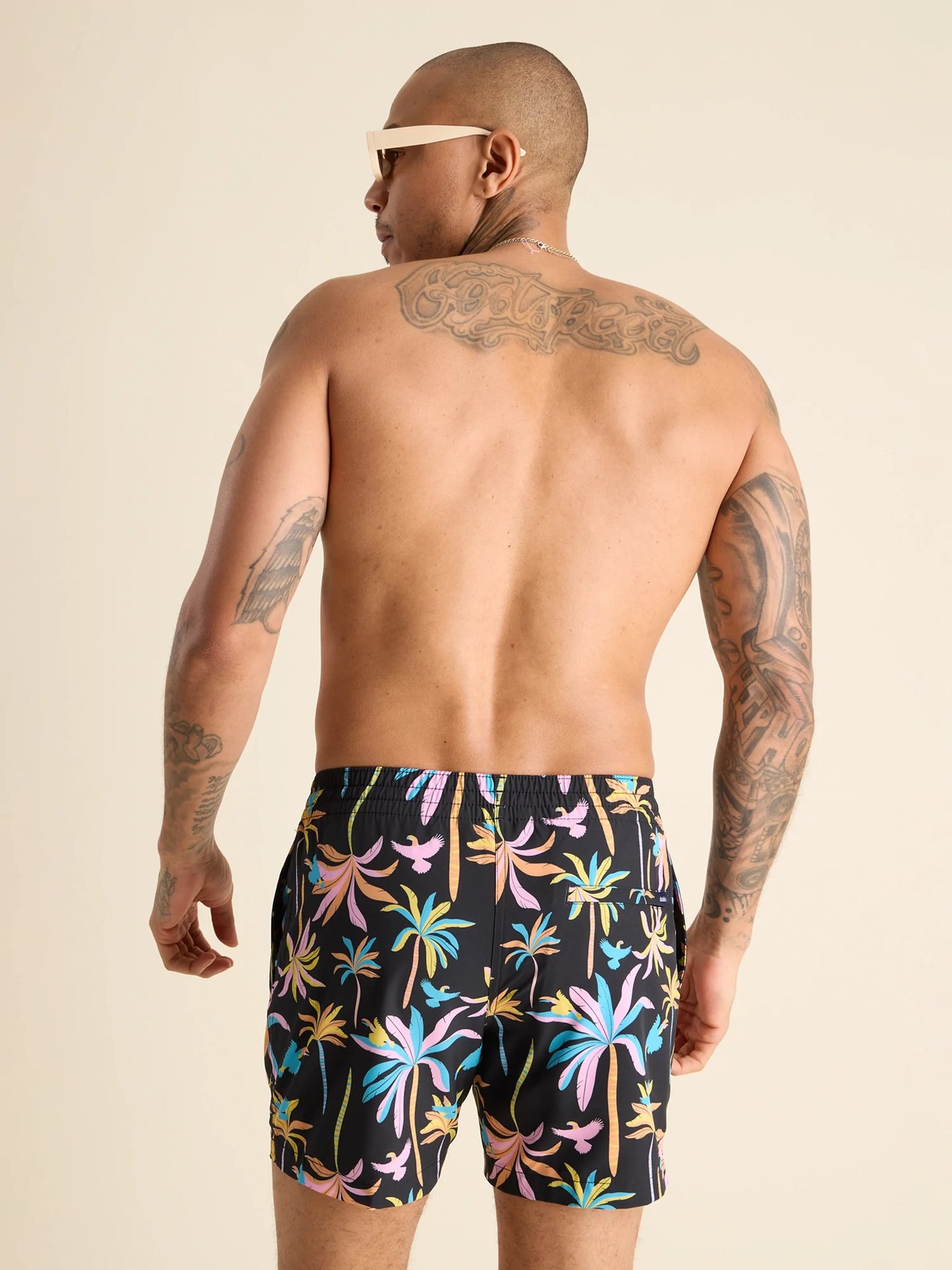 The Black Light Nights 5.5" Classic Swim Trunk